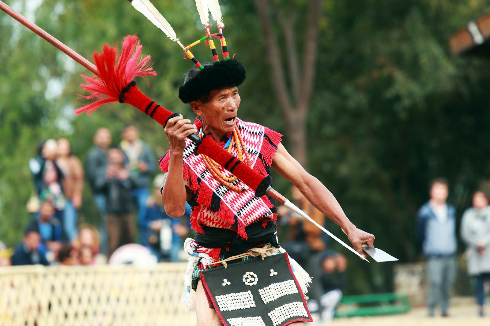 a man in a costume holding a sword